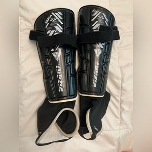 Vizari black and silver soccer shinguards.